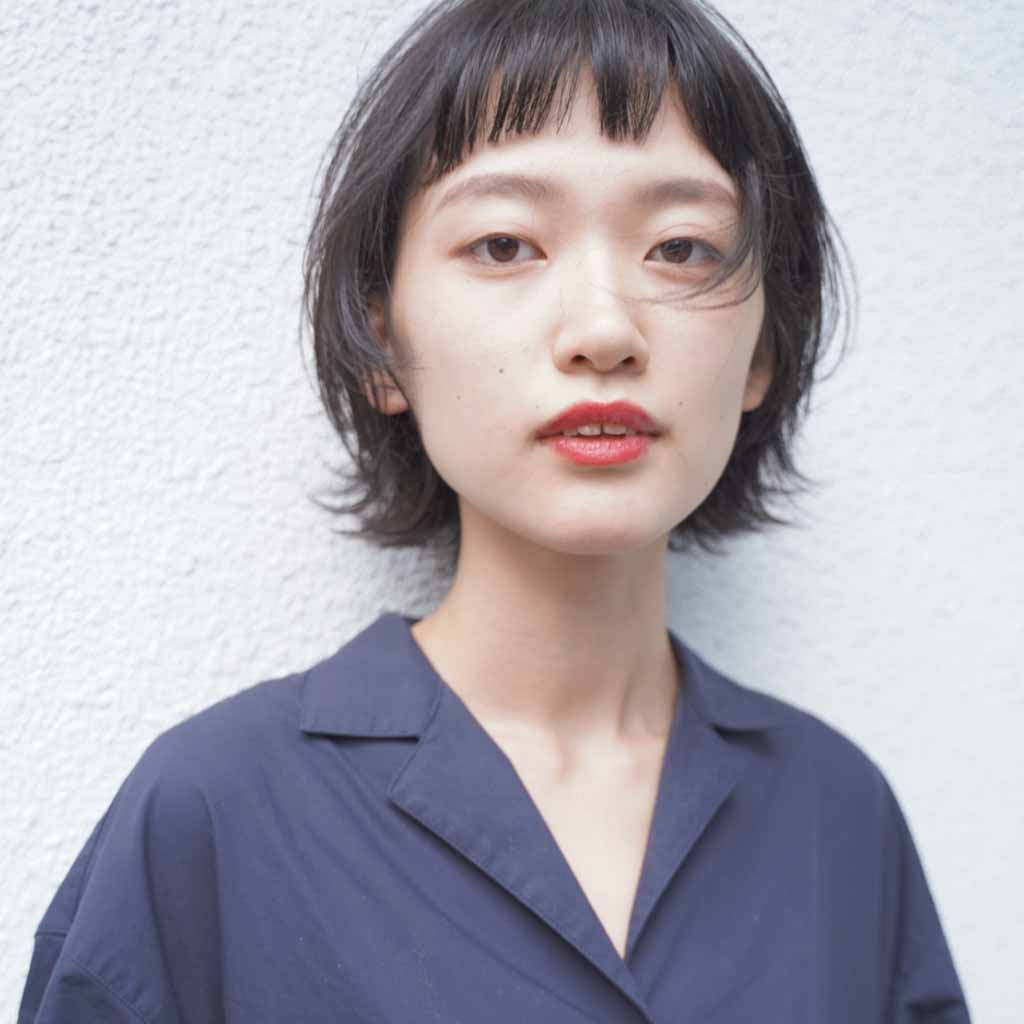 a Korean-style bob cut with micro bangs