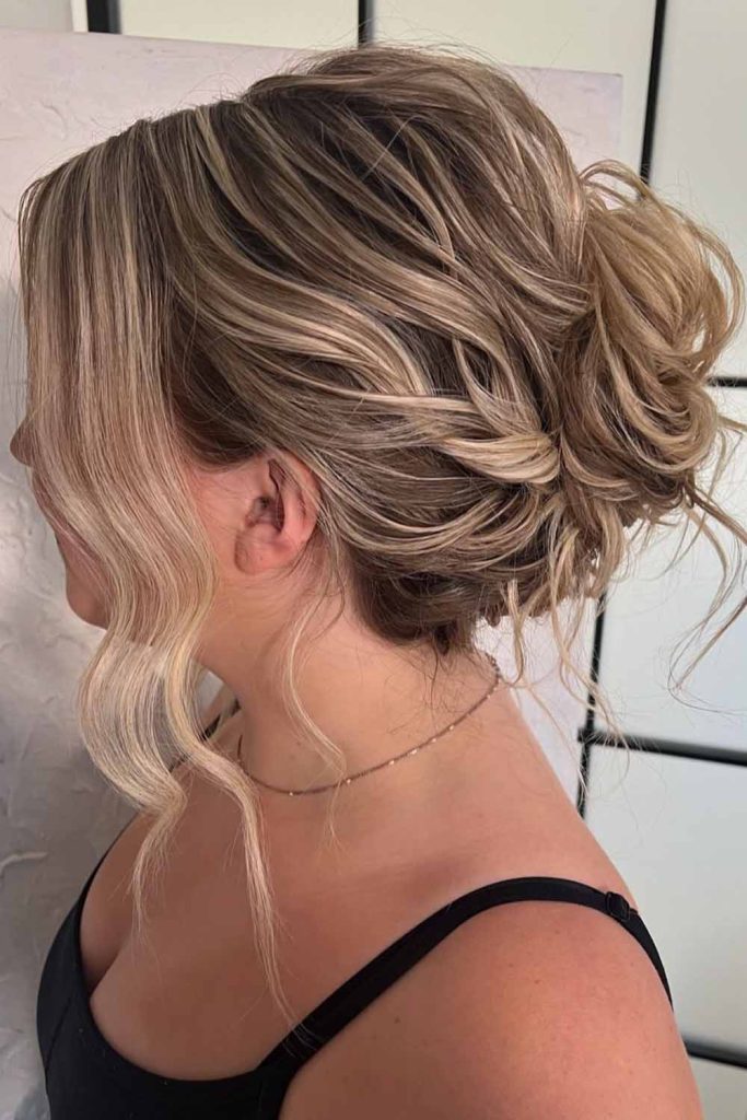 Messy Curled Bun with Loose Waves