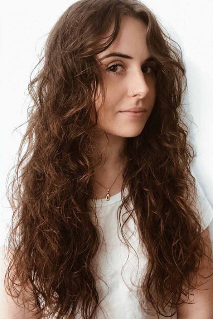 Long, Natural Curls with Subtle Layers